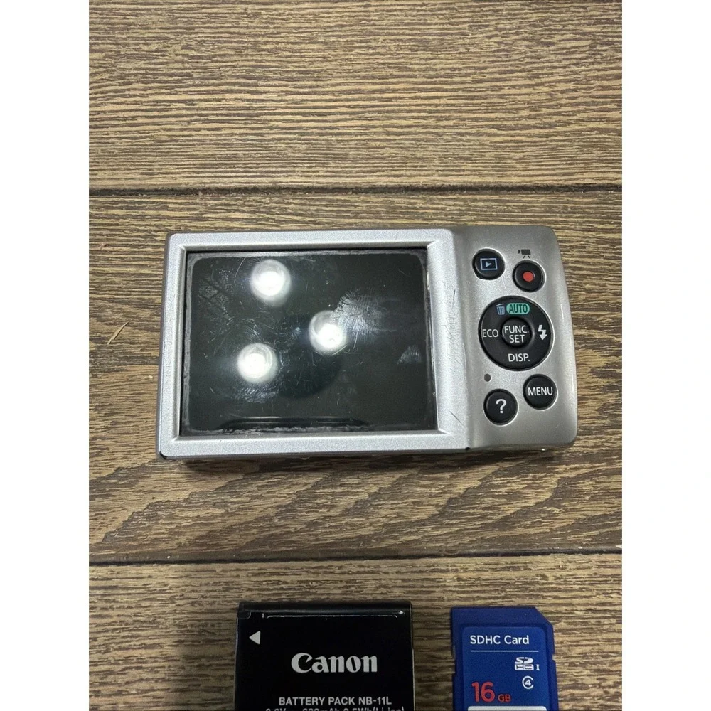 Canon Power shot GLPH135 8X Zoom 5.0-40 mm UNTESTED With Battery & SDHC Card